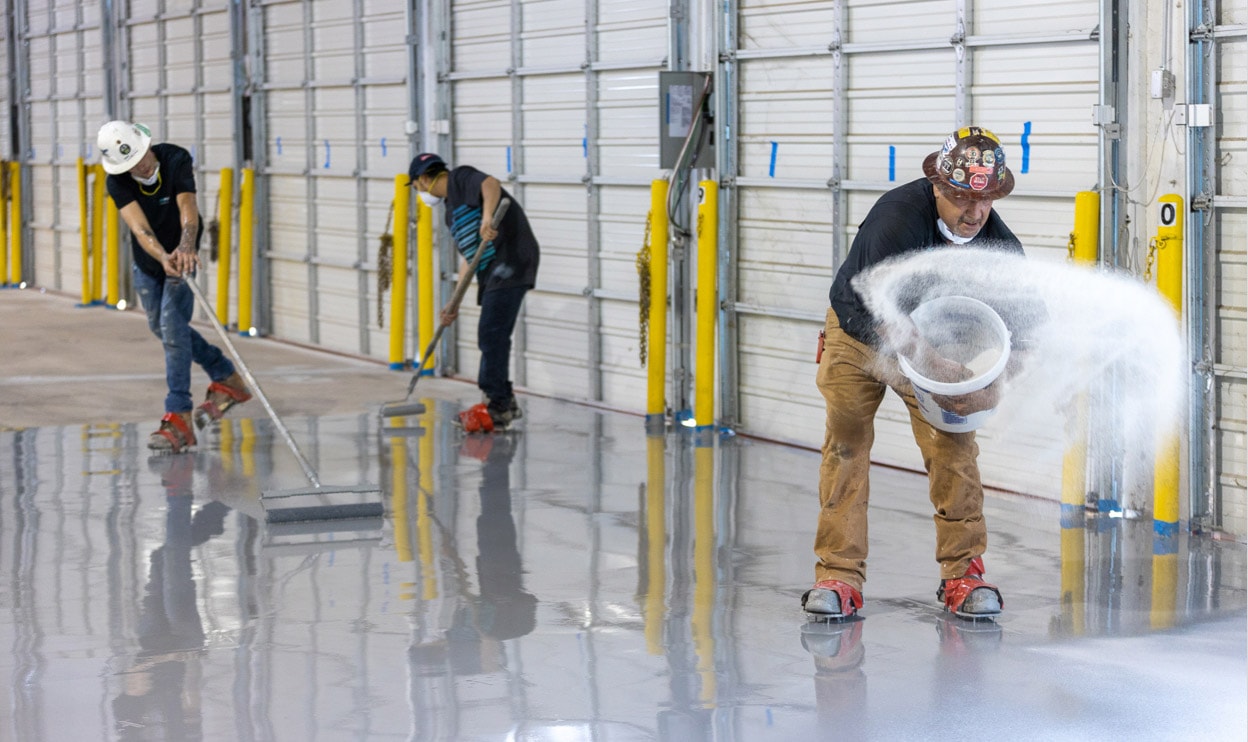 Resfloor employees installing resinous floor